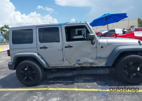 2015 Jeep Wrangler Unlimited Sport z USA, uszkodzony, nr VIN 1C4BJWDG8FL585126